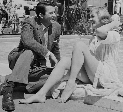 cardinales:  Gregory Peck and Lauren Bacall relaxing poolside on the set of Designing Woma