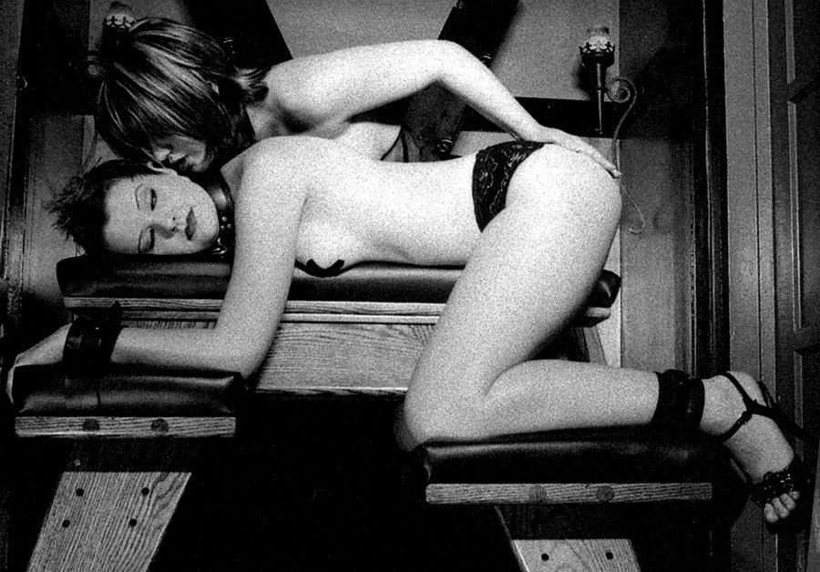 meh-ness:  Her Mistress delicately drapes her hand over her ass, arousing the tender