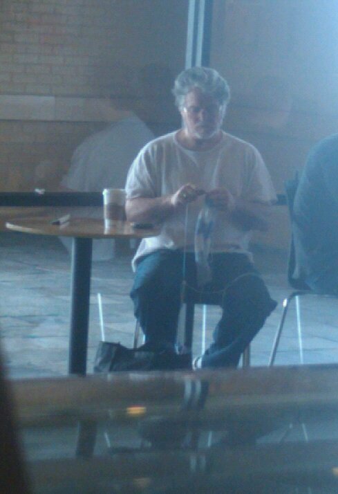 “George Lucas knits at my Starbucks every morning”
A Redditor snapped this picture of George Lucas relaxing at a Starbucks with a little knitting. Just wait til the 3D HD remastered version comes out.
Via