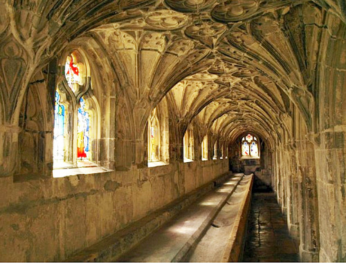 bewitchingbritain:    The south cloisters with their fan vaulted roof in Gloucester Cathed