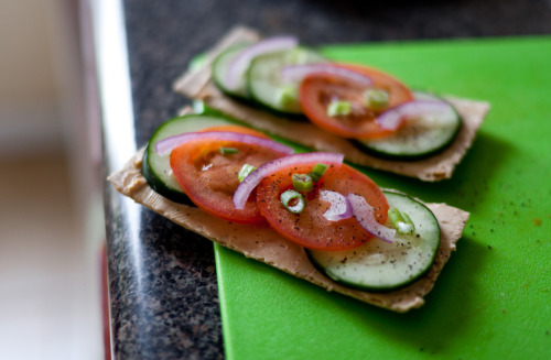 healthyalternative:  Snack Time! NEW Wasa thin & crispy sesame flatbread, Laughing Cow Mozzarella Sun dried tomato and basil spread, Cucumber, tomato, onion and pepper 135 Cal, 13g carbs 