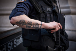 insane-atbest:  notmylinens:  uh let me marry you police officer with tattoos..  awesome tat :o 