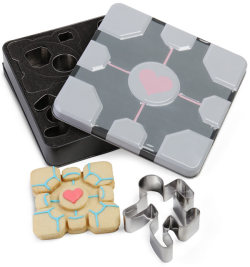 steveholtvstheuniverse:  purdaldoo:  THESE ARE PORTAL COOKIE CUTTERS.  They come with little turret cookie cutters. I NEED THESE. 