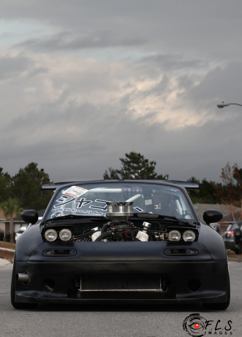 voodootimm:  gearshifter:  chrisreese:  natemeezy:  ya that is a 302 in a miata.. why do you ask?  Fuck. Holy.  id drive it.  Because Race Car. and Ive seen a lot of miatas with V8 swaps. it’s pretty common now. know a couple of guys with LS1’s in