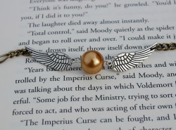 the-absolute-best-gifs:  The Wicked Clothes shop has a new bracelet in stock: now featuring the Golden Snitch Bracelet! Order now and use coupon code ‘1000NOTES’ to get 10% off your order!  Buy one now!
