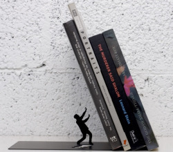  While tablets are all the rage for reading books these days, there’s still something nice about having actual books on your shelf. Art Ori’s clever bookends turn your books into a tiny action scene. 