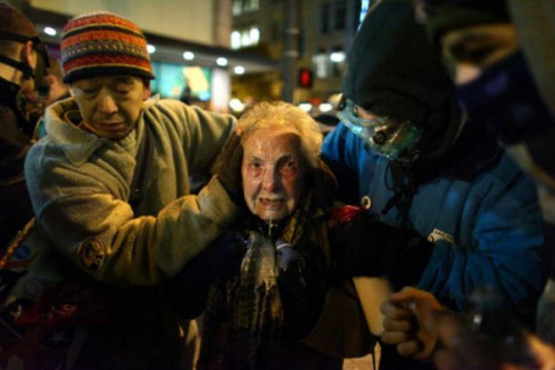 keepyourboehneroutofmyuterus:  womenoccupy:  Dorli Rainey 84, after being pepper sprayed at Occupy Seattle protest: Photo by Joshua Trujillo, SeattlePI.com [via]  I have only posted about OWS one other time. I just can’t let this go by.  This is what