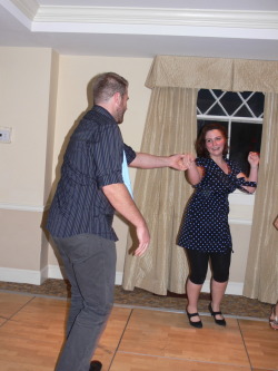 across-the-oonaverse:  Scott Evans (Chris’ brother) dancing with my sister in the polka dots and another woman whose name escapes me. 