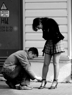 loveisalandfill:  slaveintraining:  One of the things Ms Linda likes to have me do is to tie her shoes…in public or in private.  How cute. 