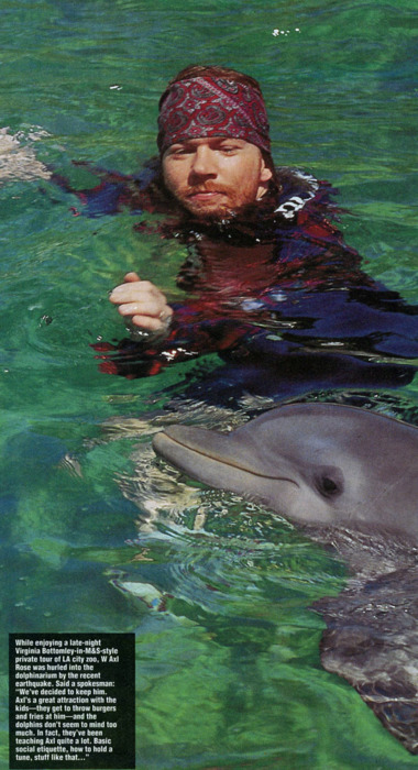 ilove-gunsnroses:  Axl DOES love dolpins ;) 