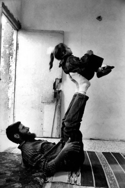 poeticislam:  One of 400 Expelled Palestinians with his daughter after His Return Home, Deir El-Balah Camp, Gaza, Palestine, 1995.  Taken by Samer Mohdad.  