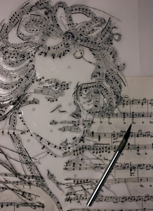 coloredmondays:  Beethoven in Music by Erika Iris Simmons Using an X-acto knife, Erika cut up actual Beethoven sheet music, carefully keeping each note and bar in place before rearranging them into a portrait of the iconic composer, as if Beethoven was
