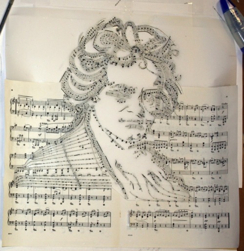 coloredmondays:  Beethoven in Music by Erika Iris Simmons Using an X-acto knife, Erika cut up actual Beethoven sheet music, carefully keeping each note and bar in place before rearranging them into a portrait of the iconic composer, as if Beethoven was