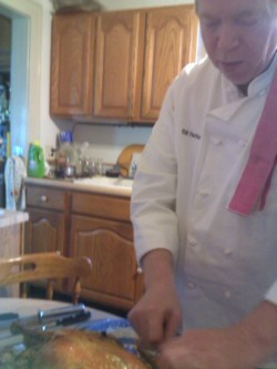 The master at work. And yes, he wears his FCI jacket every time he cooks for a large group of people. Even my family.