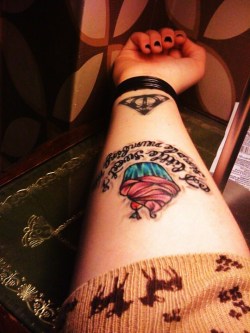 bubblegumbullets:  My newest tattoo :) Writing reads “A little sweet and simple numbing me” A nod to one of my all time favorites Jimmy Eat World &lt;3 Sorry it’s upside down. Must take a better picture. :p   