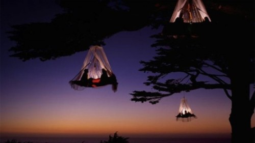 gaksdesigns:  Tree Hotels in Sweden. The hanging tent features a fabric-covered platform supported b