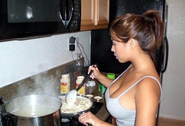 gotta love a woman who can cook, and look sexy while doing it