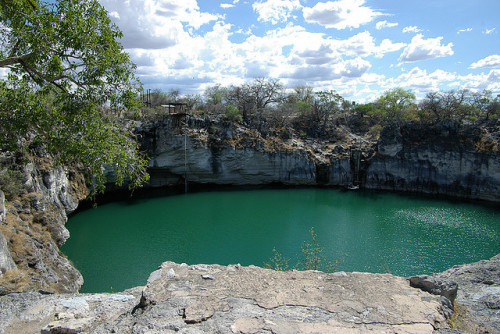 photo by Dominique Schreckling (tcom) on Flickr.Otjikoto Lake is a sinkhole lake, created by a colla