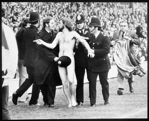 wearingraincoats:  Michael O’Brien, the first known streaker at a sporting event, running nude at a rugby match in 1974. 