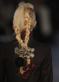 adjectival-deactivated20150115: details of Kenzo F/W 2011, braided hair adorned with silk flowers 