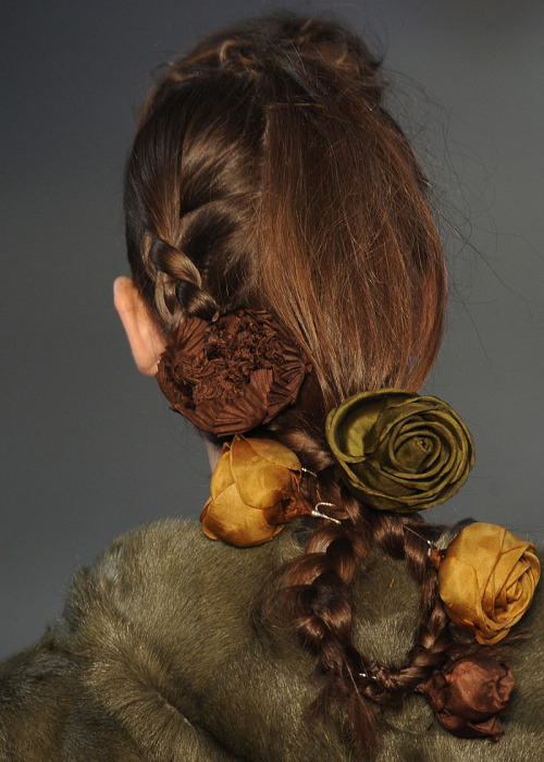 adjectival-deactivated20150115: details of Kenzo F/W 2011, braided hair adorned with silk flowers