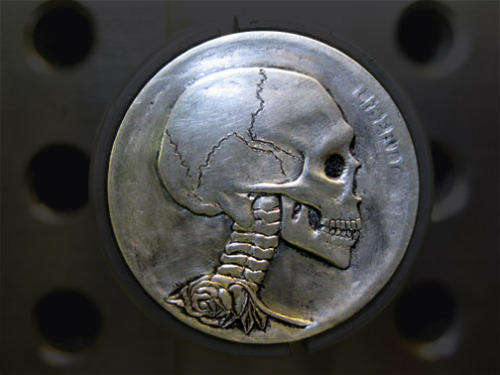 numeroclaire:  woodsmaiden:  Hobo Nickels are re-engraved/re-carved old buffalo nickels that were minted in the USA from 1917-1938. The tradition started during the Great Depression with the traveling Hobos who would alter the face of the nickel and then