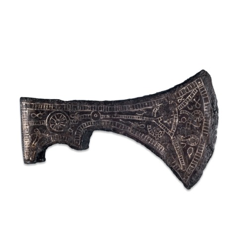 A Merovingian axe-head from the 7th century, found in Germany. The axe is made of iron and inlaid wi