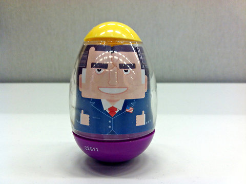 As someone who owns a Hockey Moms for Palin puck, a Straight Talk Express shot glass, a President Obama nesting doll from Russia and loads of other weird campaign memorabilia, I WANT a Mitt Romney Weeble.