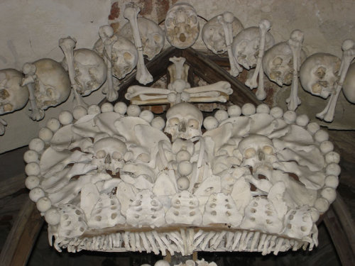 madelezabeth:  skandning:  Outside of Prague, in the Czech Republic, is a small Roman Catholic Church that looks normal on the outside but holds 40,000 to 70,000 skeletons on the inside. Officially called the Sedlec Ossuary, it is often just referred