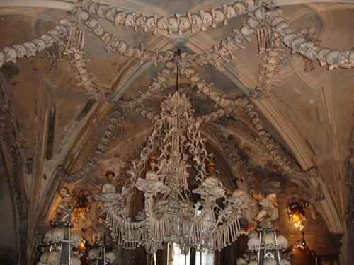 madelezabeth:  skandning:  Outside of Prague, in the Czech Republic, is a small Roman Catholic Church that looks normal on the outside but holds 40,000 to 70,000 skeletons on the inside. Officially called the Sedlec Ossuary, it is often just referred