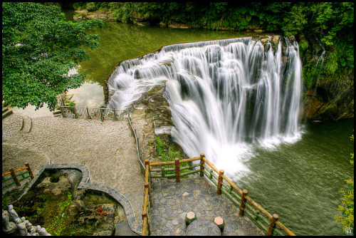 photo by omegach on Flickr.Shifen waterfall is a scenic waterfall located in Pingxi District, Taiwan