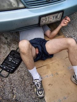 dadsonsex:  Uncle Tom works on his car.