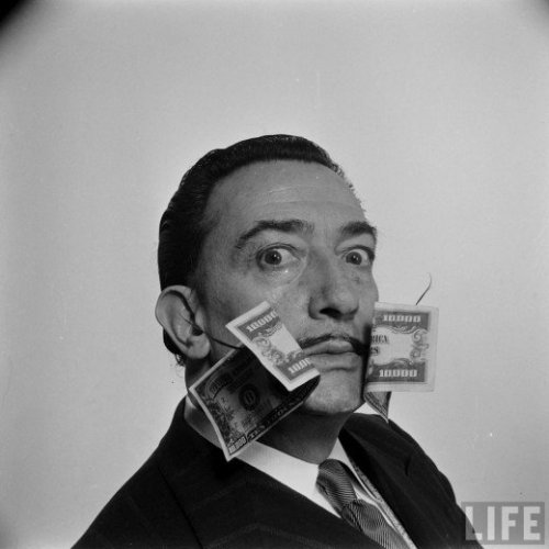 This is a picture of Salvador Dali with two $10,000 bills impaled on his mustache.  Your argume