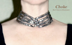 Anatomology’s skeleton hands choker,