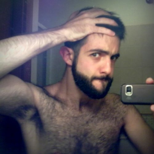 Seriously cute hairy guy. Love the smirk, you look very playful.