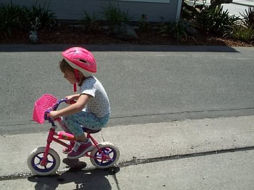 sailthroughthenight: Rhiannon on a bike.