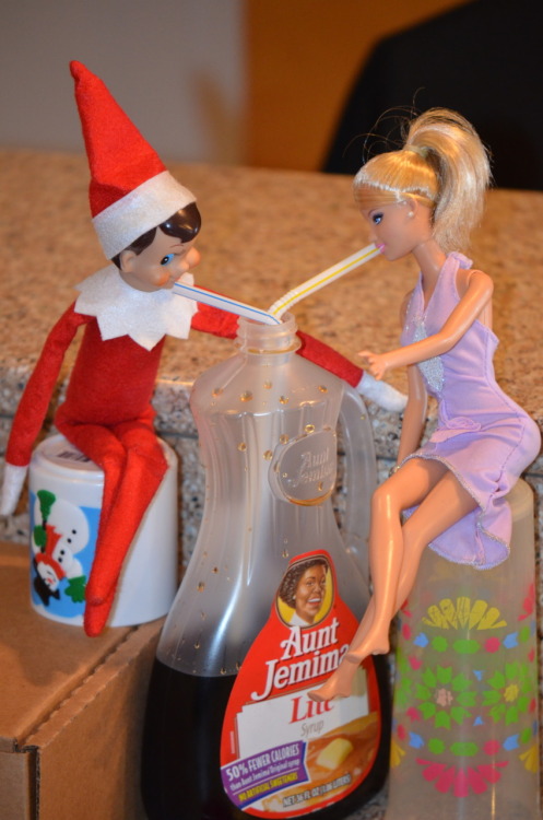 Sipping on Syzzrp Elf on the Shelf Clyde is always hitting on Barbie.