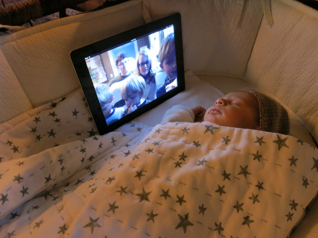 Maxwell, the 4 days old genius! Already enjoys skyping his cousins from bed.