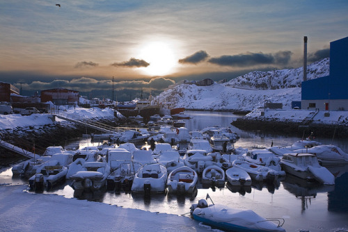 by Petur Bjarni on Flickr.Snow-covered boats in Nuuk - the capital of Greenland.