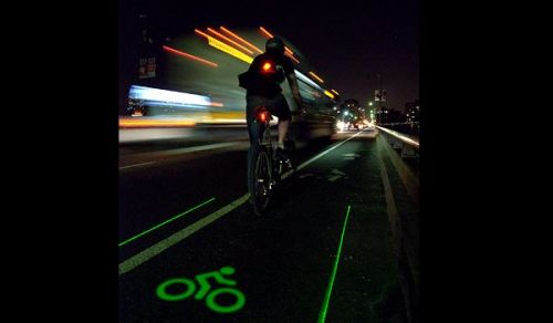 enbicivoy:  LightLane Lazer Bike Lane Gives cars, cyclists and pedestrians an idea of the amount of 