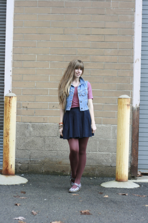 Burgundy tights with blue skirt, denim vest and pink top