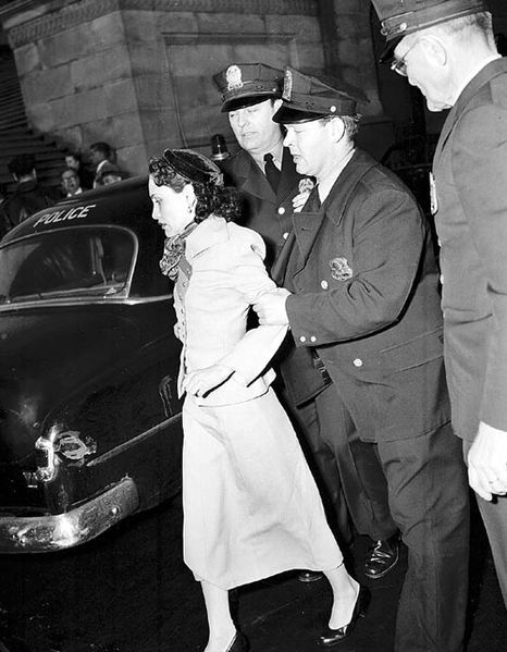  Lolita Lebrón being arrested after the armed assault at the House of Representatives
