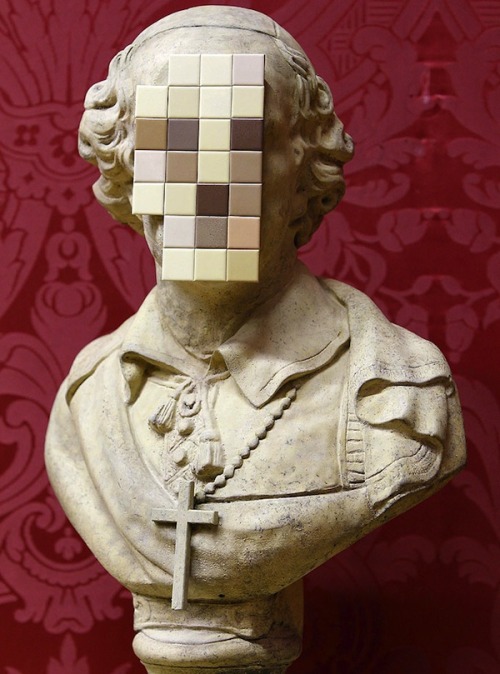 “  Oh, the Catholic church won’t be happy about this. Banksy just unveiled a brand new sculpture called Cardinal Sin which is a 18-century stone bust of a priest with its face sawn off and replaced by blank “pixelated” bathroom tiles. It was created...