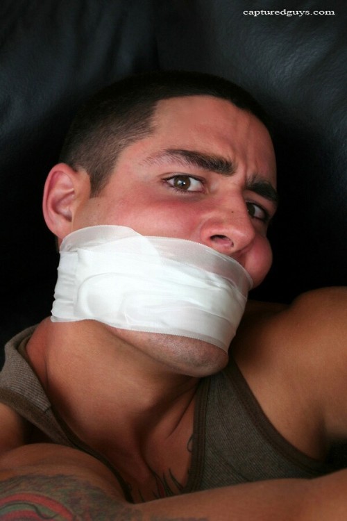 justgaggedmen: Lorenzo tapegagged.