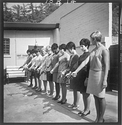 LAPD female officers posing for gun inspection, 1966