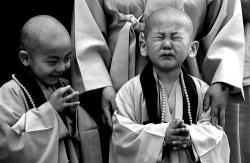 iwanted2c1post:  “A child cries after having his head shaved by Buddhist monks during a “Children Becoming Buddhist Monks” ceremony at a Chogye temple on May 3 in Seoul, South Korea. The children will stay at the temple to learn about Buddhism for