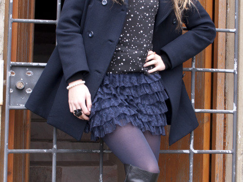 Blue tights, ruffled skirt and classic cut coat + black shirt with tiny star pattern