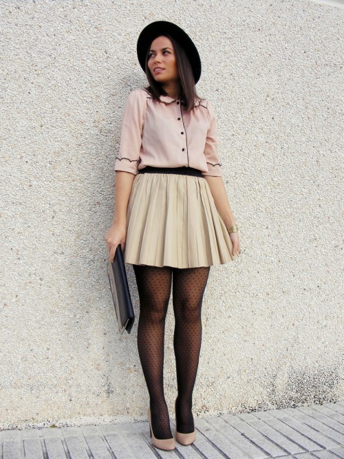 Black polka dot tights with salmon shirt and plaid beige skirt