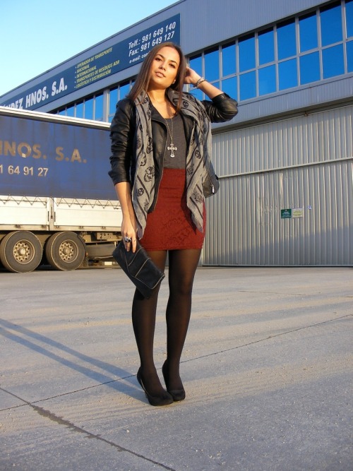 Burgundy lace skirt and grey top with black tights, heels and skull patterned silk scarf