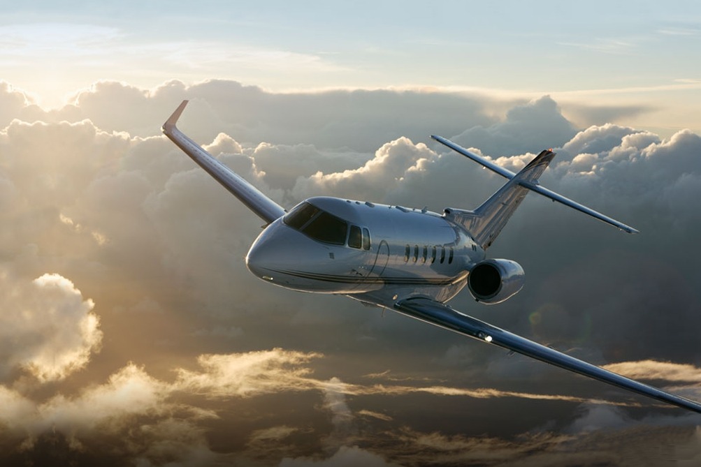  the aeroplane flies high  turns left looks right